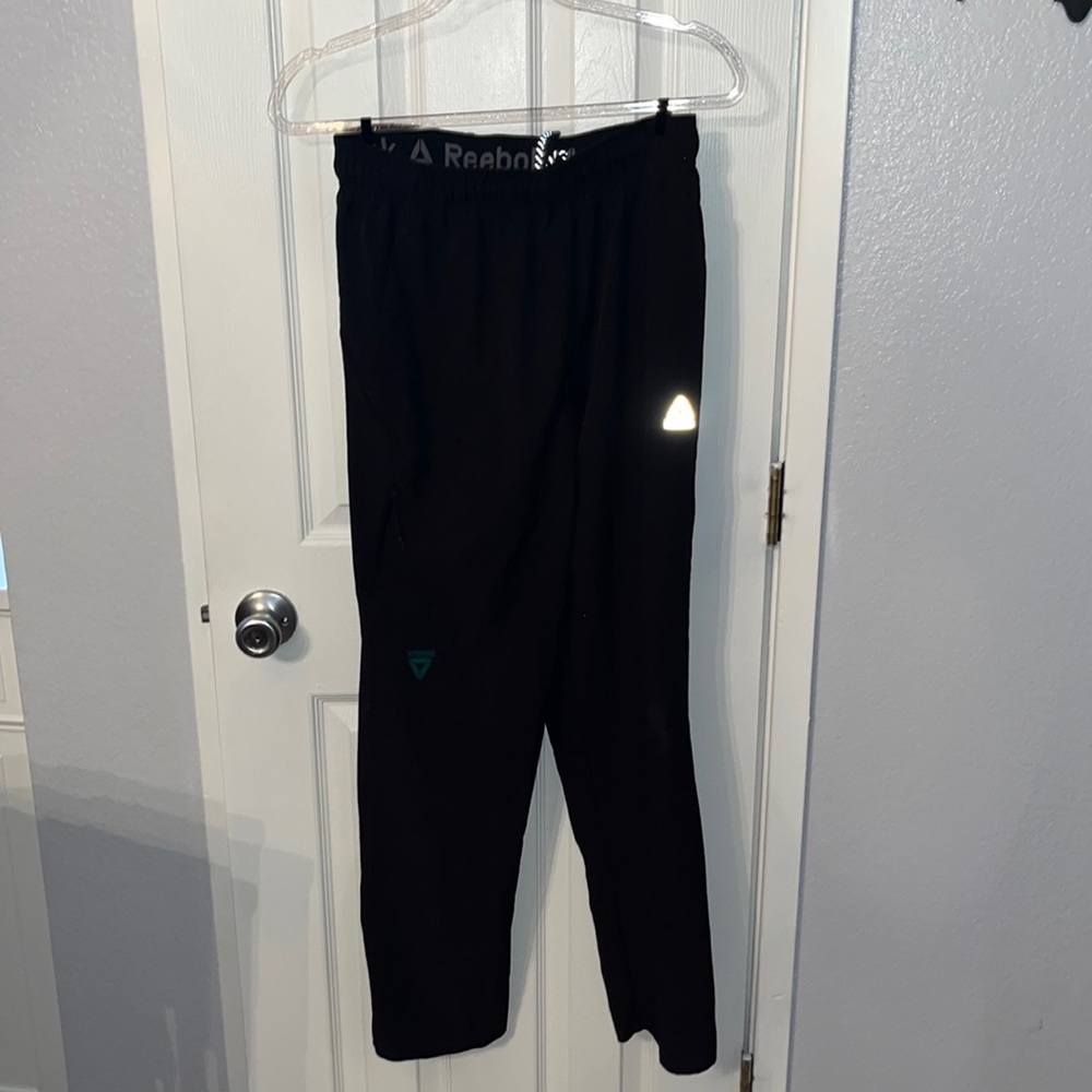 Reebok men’s joggers with zipper key pocket and zipped bottoms